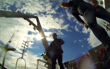 Divers from the Martha's Vineyard Coastal Observatory operations team return topside to the Tioga.